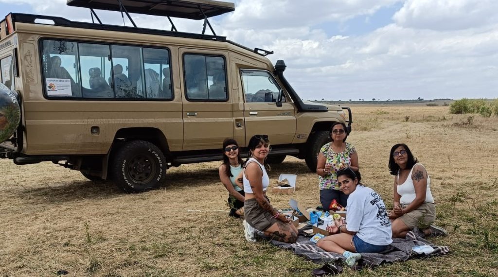 Happy travellers enjoying a safari experience